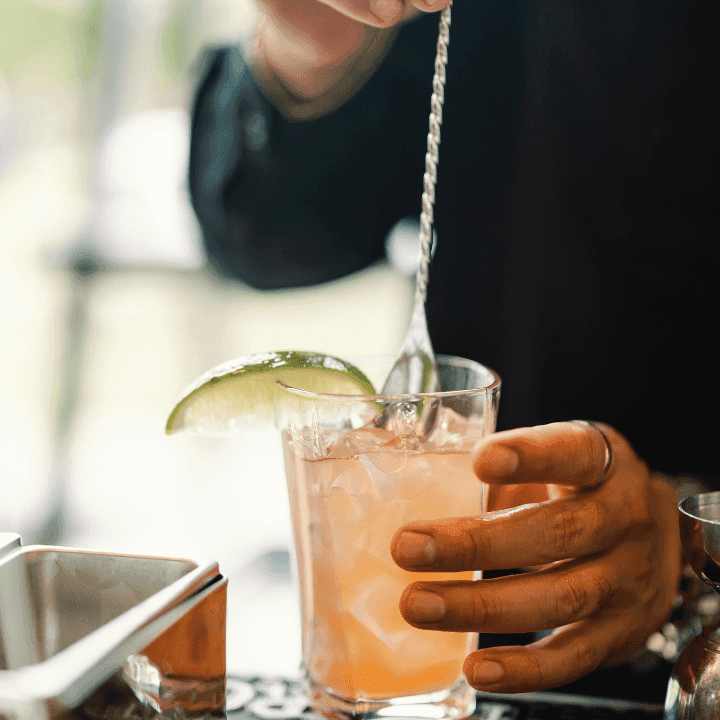 Close Up of Bartender mixing a drinks