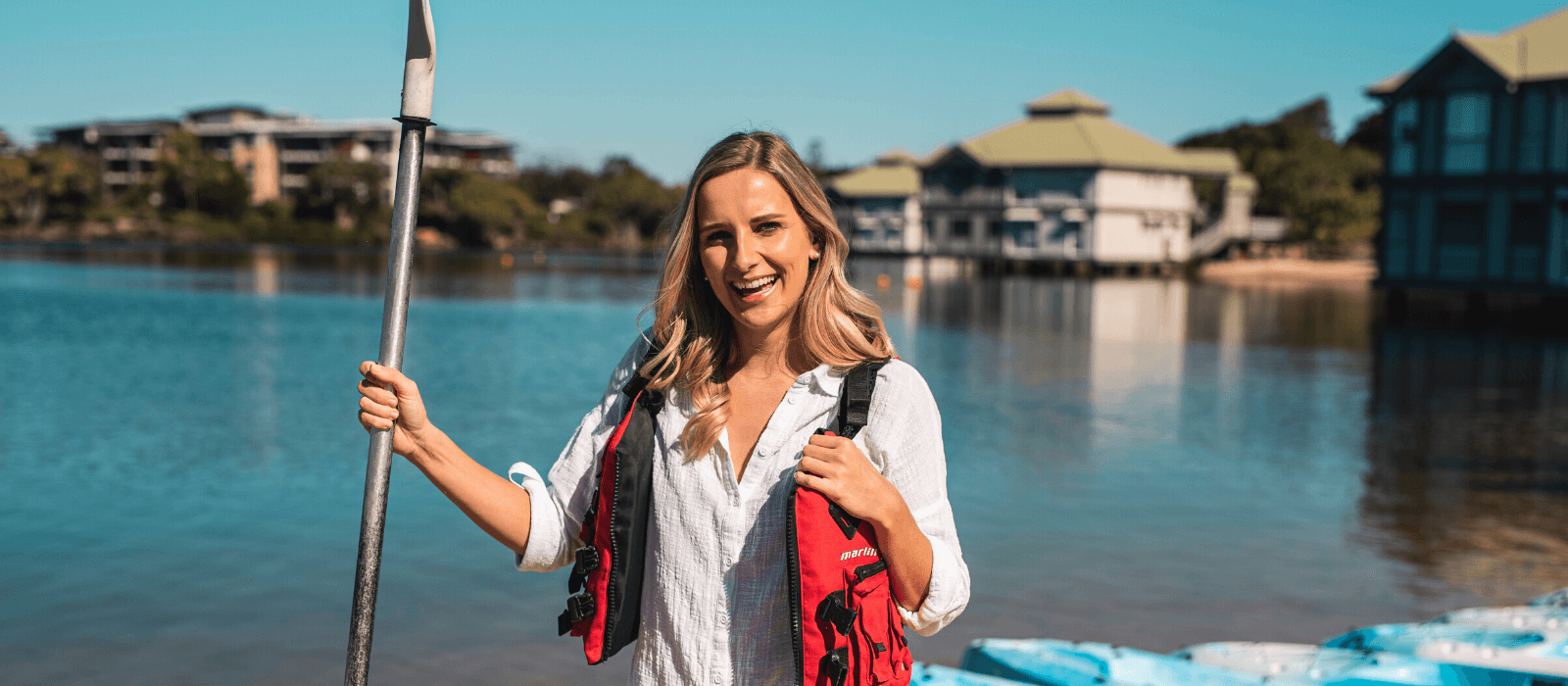 A lady with a life jacket in Novotel Sunshine Coast Resort 