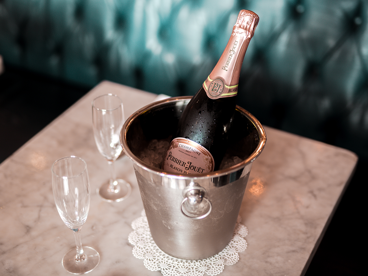 Close-up of a champagne bucket & glasses at South Beach Hotel