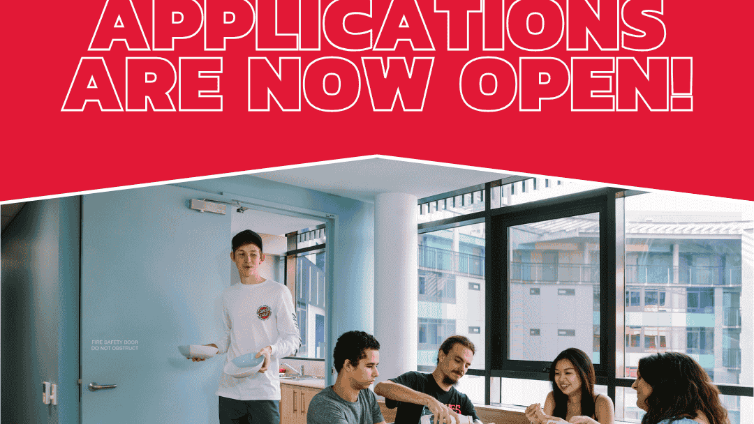 Poster for 2026 applications with people at a table and a man by the door.