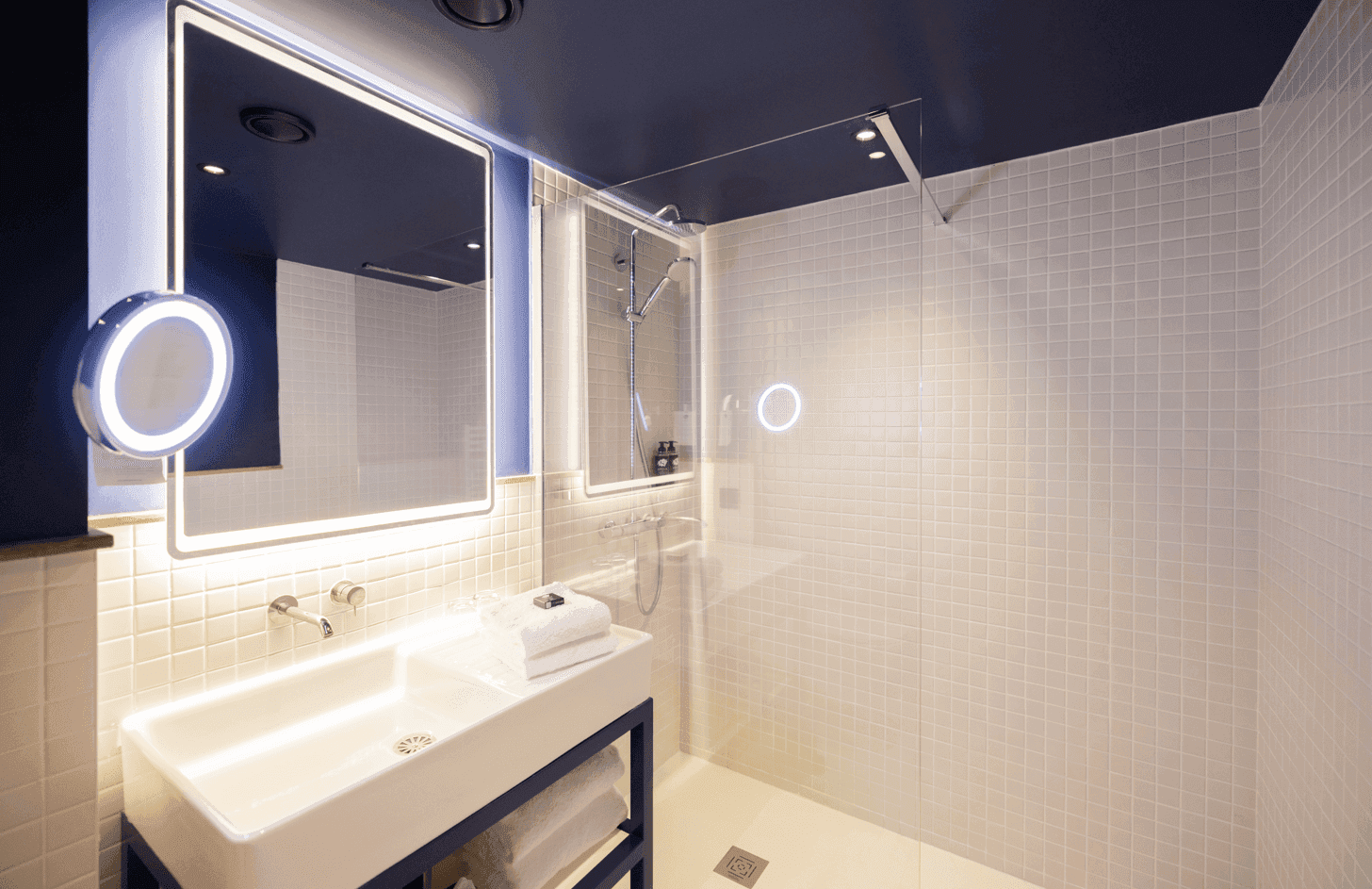 Bathroom shower & vanity in Cosmik Room at Kopster Hotel Paris Ouest Colombes