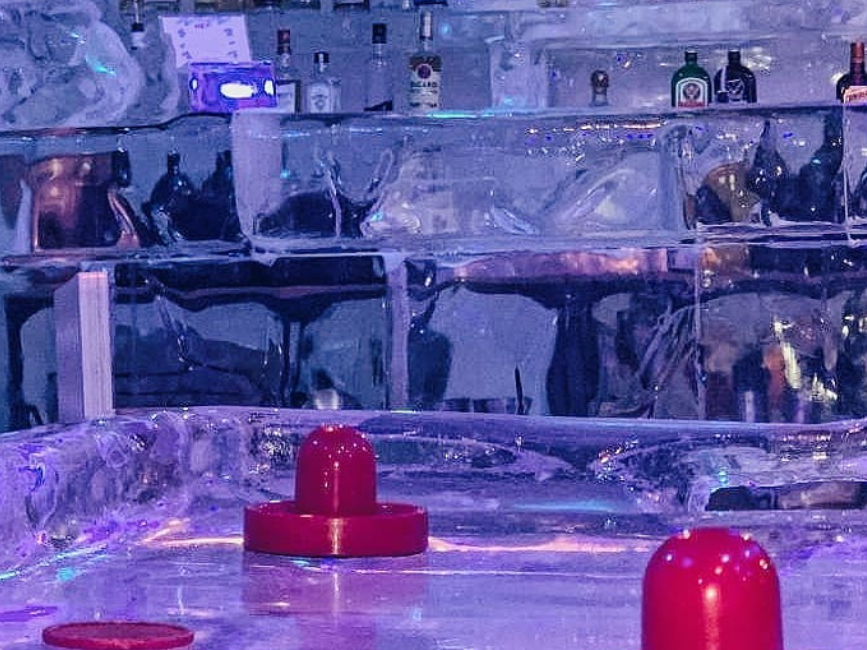 Ice hockey table located near the bar