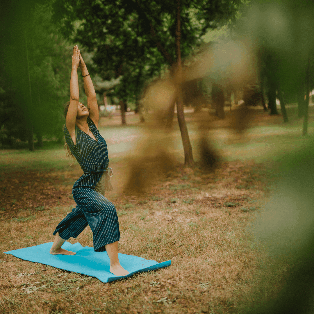 A women doing a sunrise yoga pose