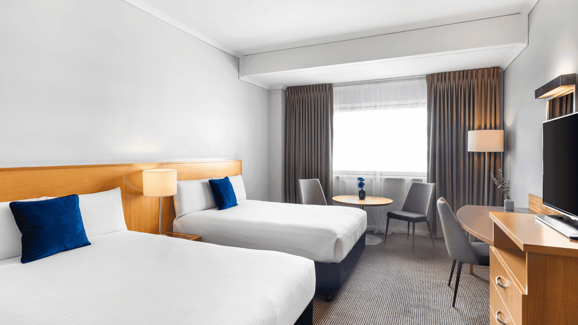 Novotel Perth Langley's standard double room, queen and double bed or twins double beds with large window