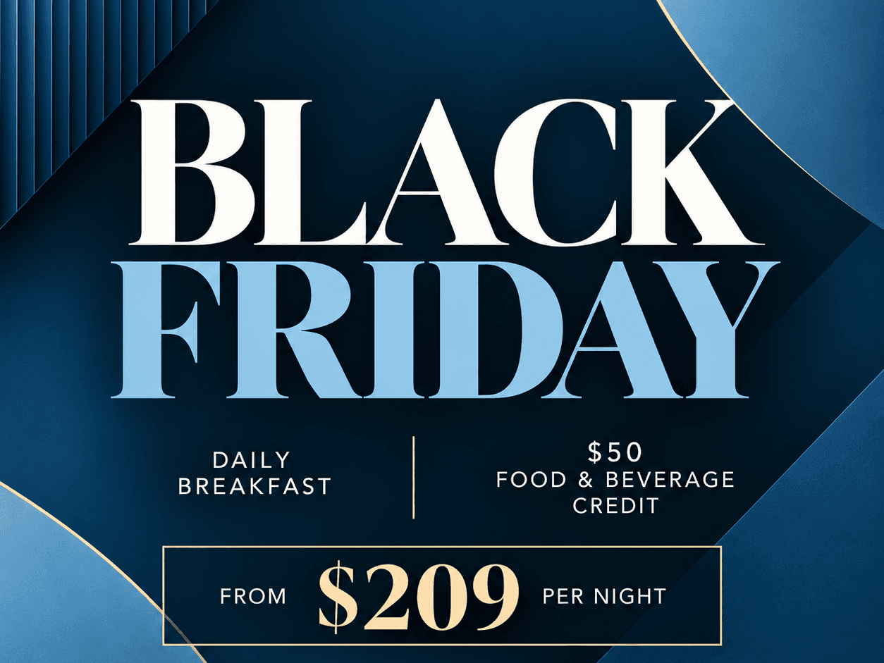 Black Friday offer at Hotel Grand Chancellor Townsville from $209 per night, including daily breakfast and a $50 Food & Beverage credit. Features elegant navy and blue abstract graphics with gold accents.