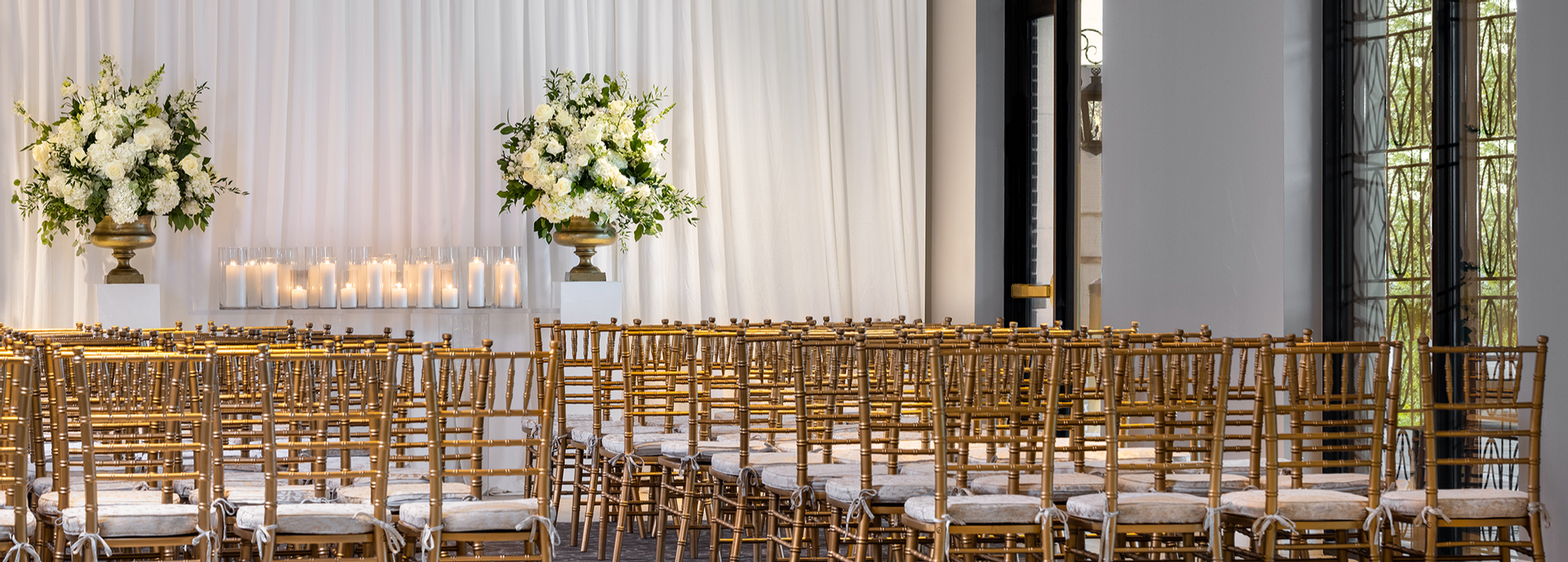 Chairs set up for a wedding reception at Warwick Melrose Dallas