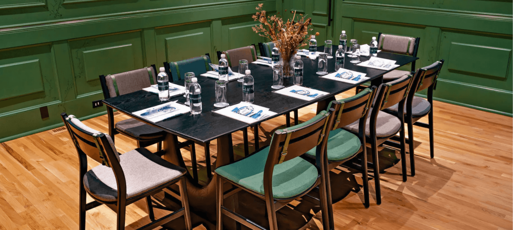 A newly built meeting room with a long table to seat many guests