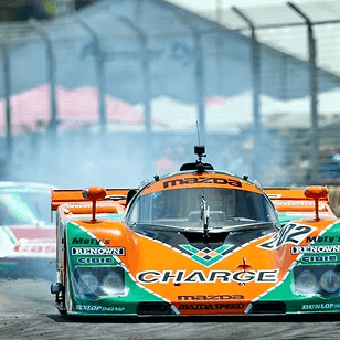 Two race cars compete at the Adelaide Motorsport Festival.