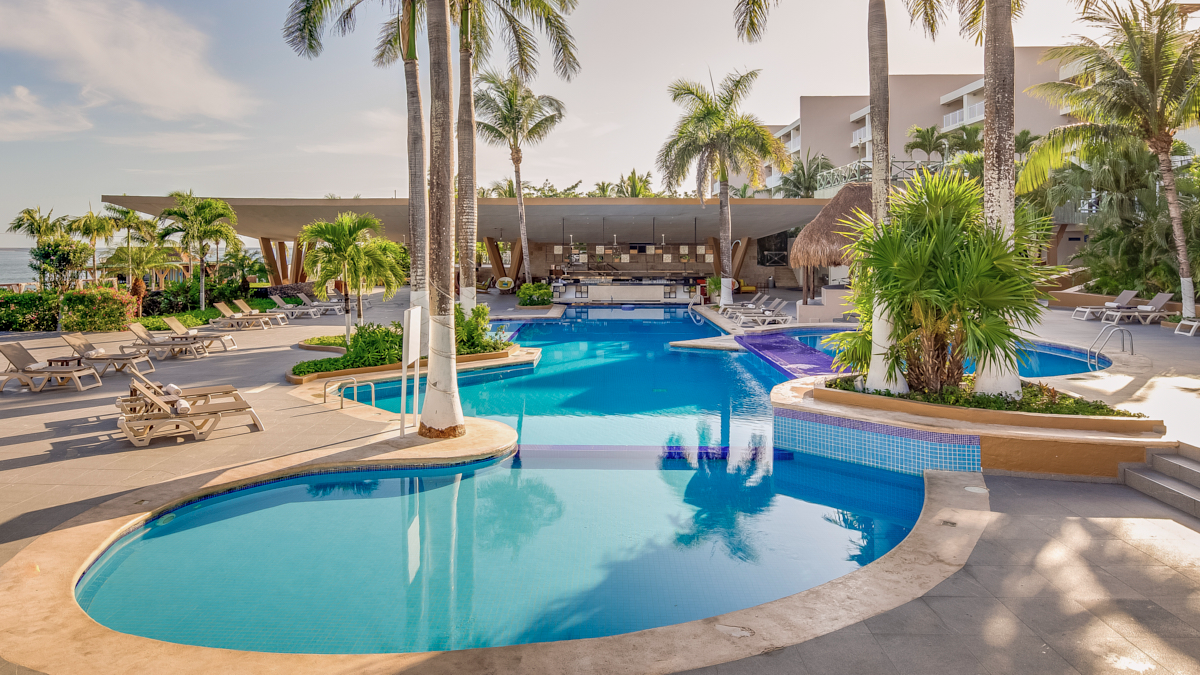 An Outdoor pool area at FA Cozumel All Inclusive