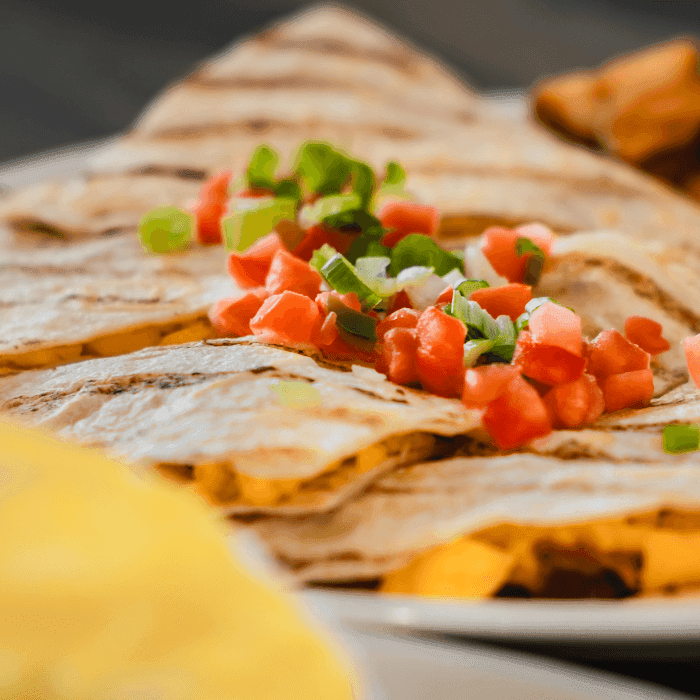 Breakfast Quesadilla with pico de gallo on top at Coastal Blue Restaurant offering late breakfast in the Wildwoods NJ