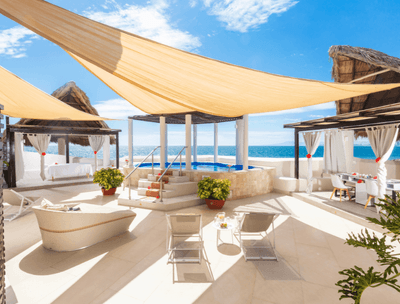 Shakti Spa with pool, loungers, cabana, and ocean view at Buenaventura Grand Hotel and Spa