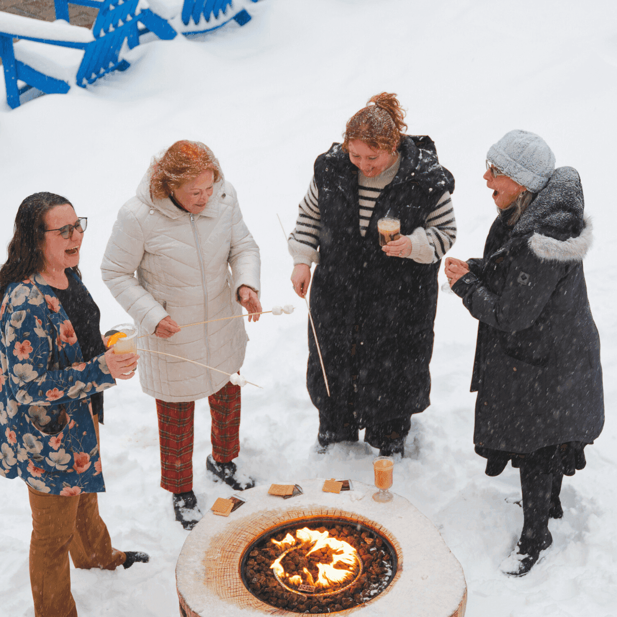 Lively evening by the fire pit as guests share laughs and roast s’mores