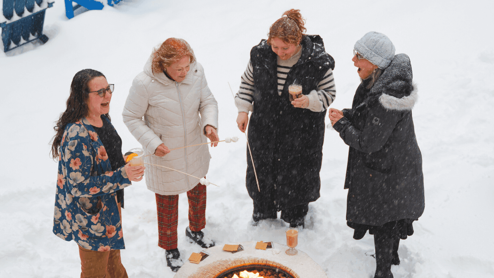 Lively evening by the fire pit as guests share laughs and roast s’mores