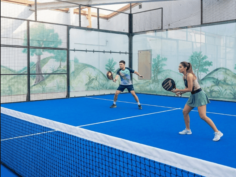 Guests enjoying a friendly match of padel at Two Seasons Hotels & Apartments 
