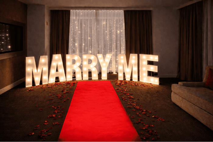 A red carpet leads to a 
