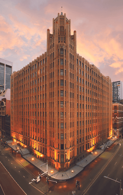 Exterior view of the hotel in the evening at The Grace Sydney