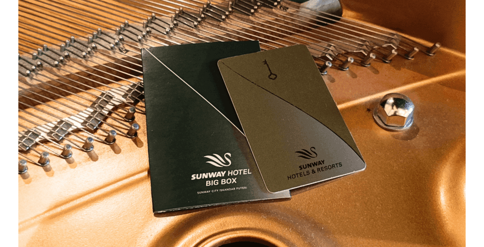 Two Sunway Hotel keycards on a dulcimer musical instrument at Sunway Hotel Big Box