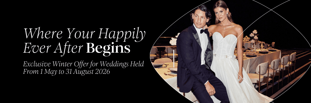 Bride and groom in elegant attire at a decorated wedding reception, promoting an exclusive winter offer for  weddings