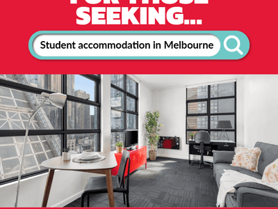 Student Living room with table, couch, and office area at 339 Swanston.