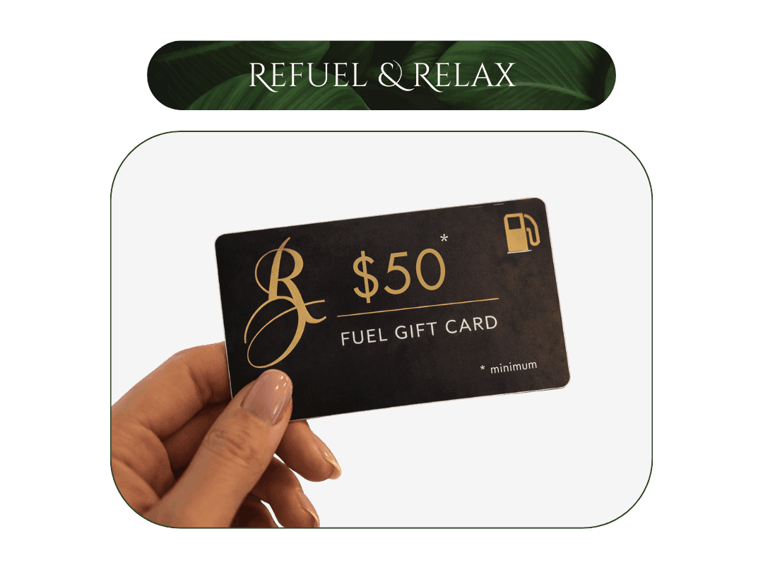 Hand holding a $50 fuel gift card 