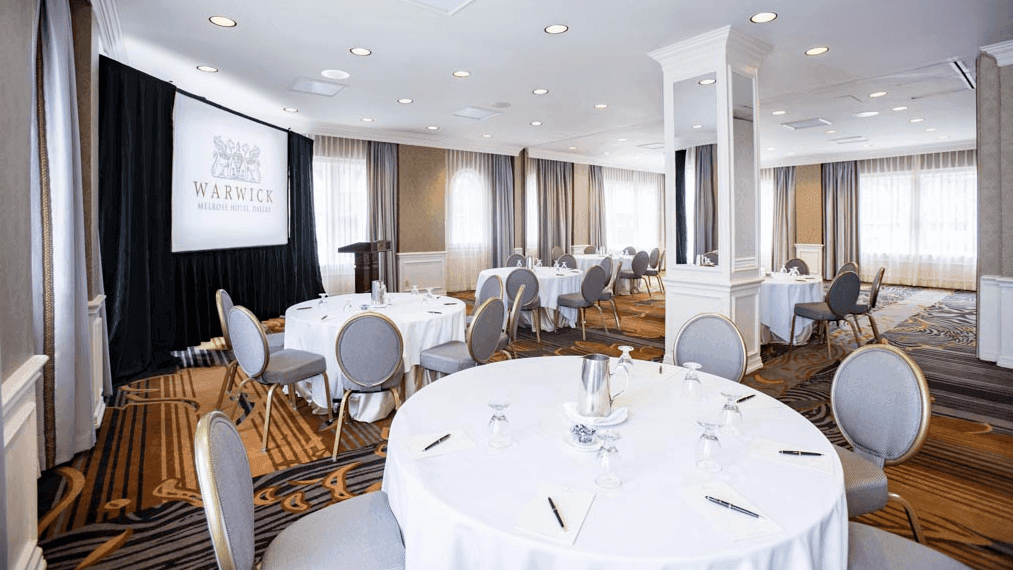 Banquet tables set-up for an event at Warwick Melrose Dallas