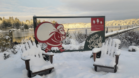 Garden chairs covered in snow at Alderbrook Resort & Spa