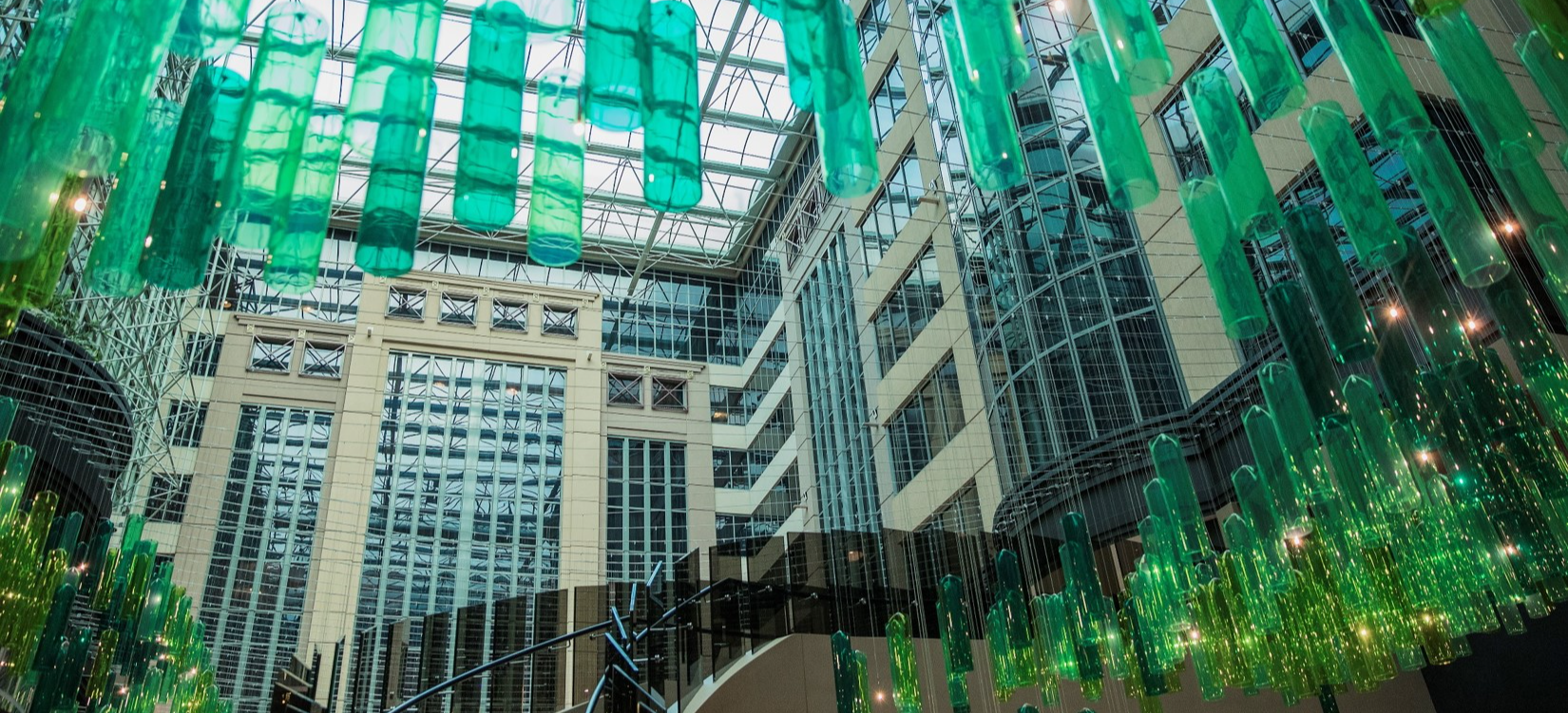 Green lanterns hung on ceiling of Melbourne On Collins 