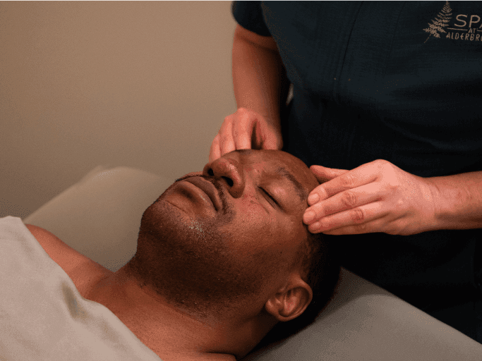 A man getting spa treatments in the spa at Alderbrook Resort & Spa