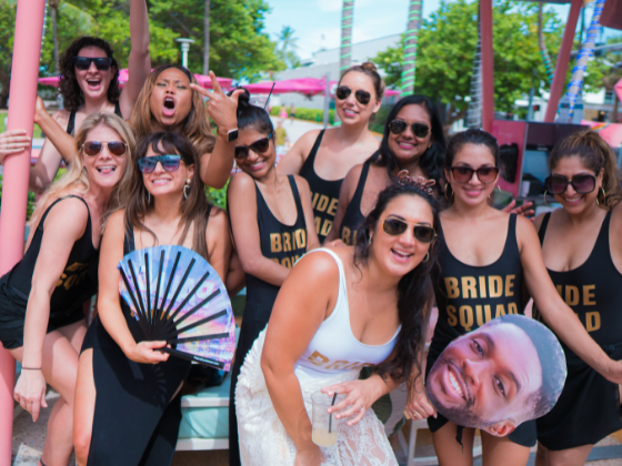 Group of girls posing to a photo at Clevelander South Beach