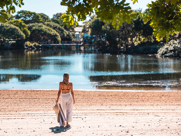 A lady looking at water in Novotel Sunshine Coast Resort