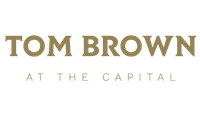 Official logo of Tom Brown at The Capital