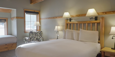 Interior of the Alcove room with king bed at Sleeping Lady