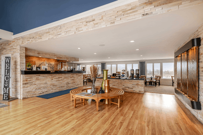 Dining area with tables and seating at Ogunquit River Inn