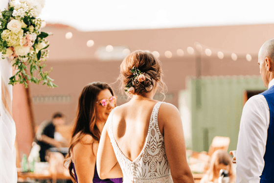 Wedding couple talking to the guests at Kinship Landing