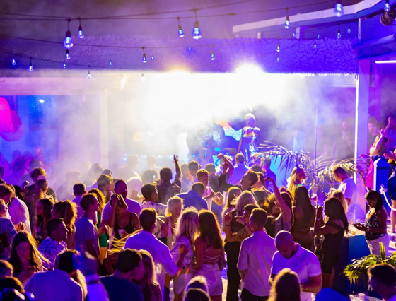 Crowd gathered at an event in The Morgan Resort Spa Village