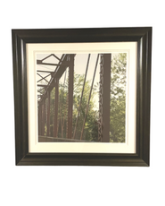 Wall art of a bridge with black frame at Hotel 43