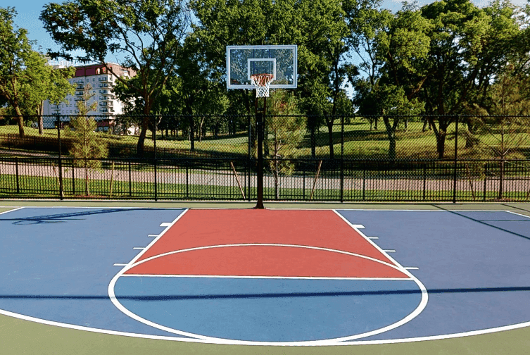 An outdoor basketball court at Shangri-La Monkey Island