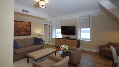 Living room of a River View Suite at The Abbey Inn