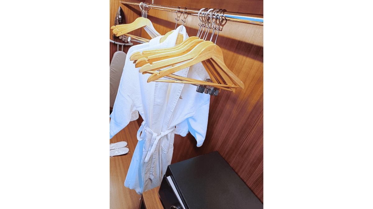 Bathroom with a toilet and towels in Deluxe Plus King at Sunway Hotel Big Box