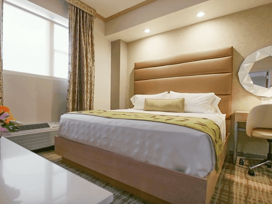 a bed in a hotel room