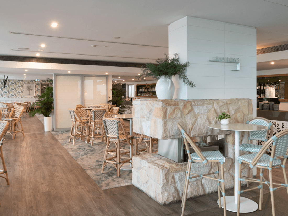 Interior & decor of the Shallows Bar with marbel floors at Pullman Magenta Shores