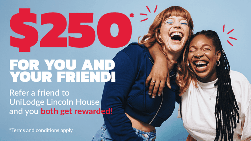 Two friends laughing with $250 offer for referring a friend to UniLodge Lincoln House.
