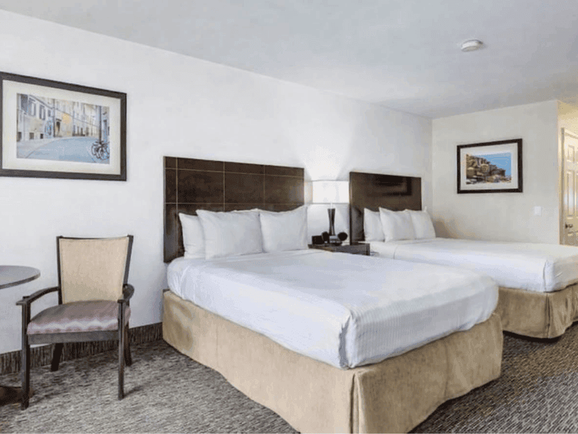 Premier room with two queen beds with furniture 