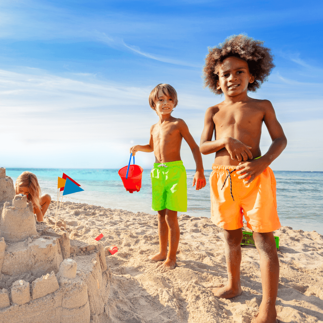 ICONA Avalon Kid's Activities Children on Beach Building Sandcastle