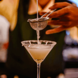 bartender pouring a drink