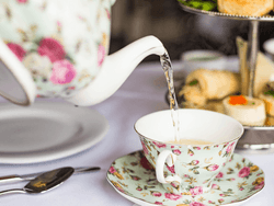 Close-up of pouring tea in Pendray Tea House at Pendray Inn & Tea House