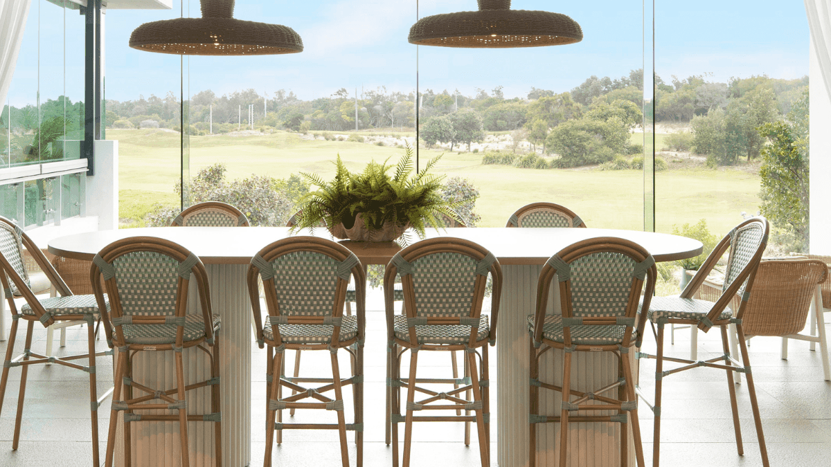 Dining set-up in Shallows Bar overlooking the golf course at Pullman Magenta Shores