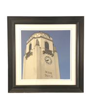 Wall art of a clock tower with black frame at Hotel 43