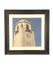 Wall art of a clock tower at Hotel 43