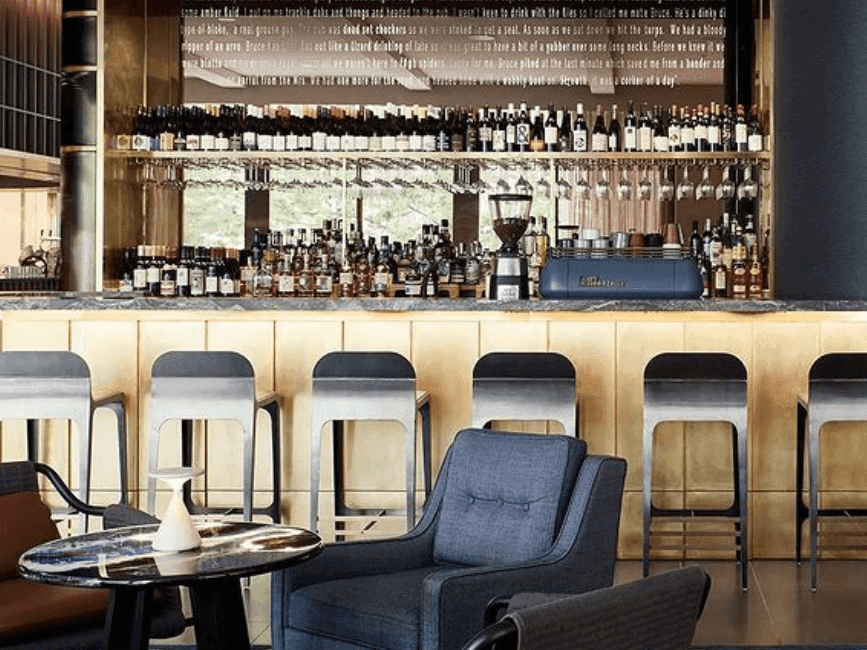 High chairs facing the bar